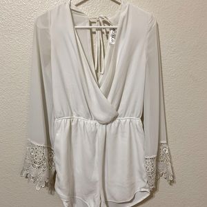 Wyldr white romper with lace